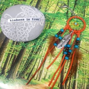 Decorative stone and dream catcher charm